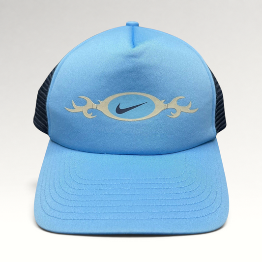 Raree Finds vintage light blue Nike trucker hat with a tribal oval swoosh graphic and navy mesh back panel