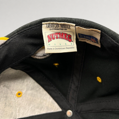 Raree Finds vintage Nutmeg Mills and American Needle hat interior labels showing Team NFL branding