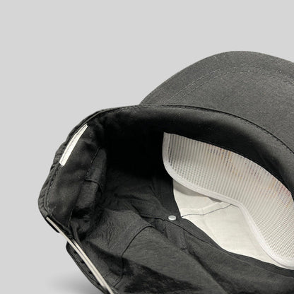 Raree Finds vintage 1995 Aspen Air Show black nylon snapback hat interior view showing white mesh lining