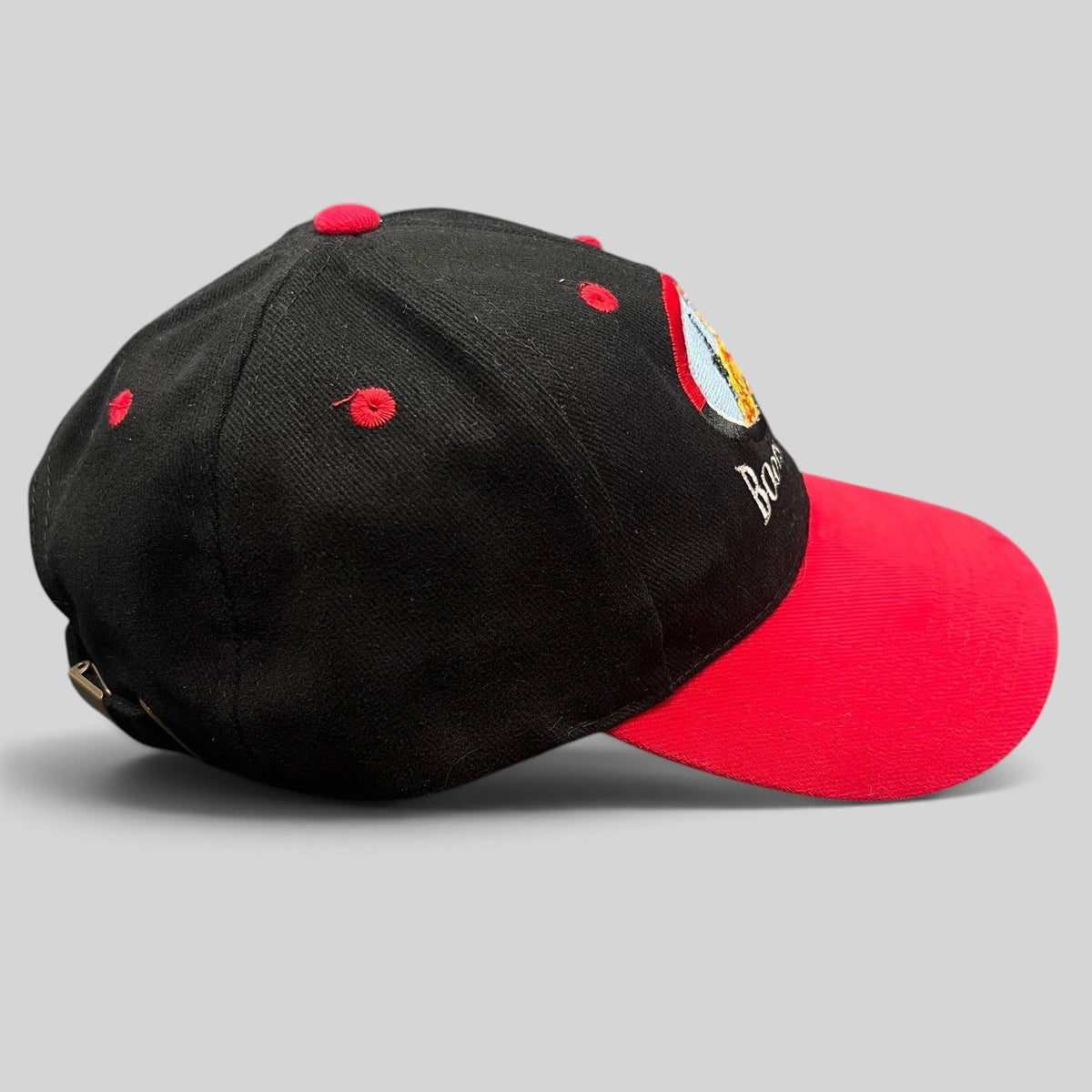 Raree Finds vintage Boots & Coots oilfield firefighter snapback hat with black crown, red brim, and embroidered logo.
