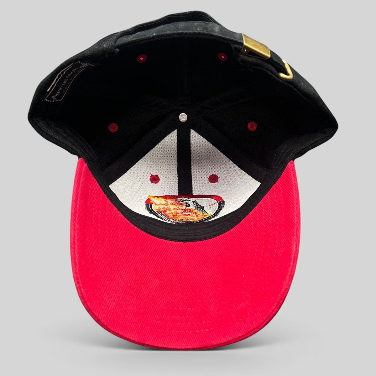 Raree Finds vintage Boots & Coots oilfield snapback hat with black crown, red brim, and embroidered flame logo interior