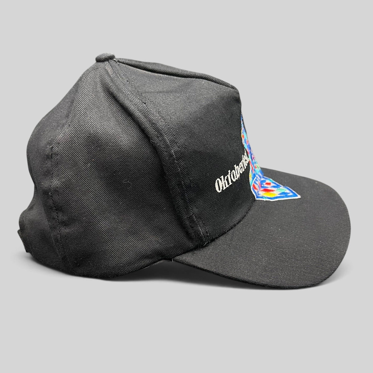 Raree Finds vintage 1993 Oktoberfest Munich black cotton strapback hat with colorful Bavarian embroidery