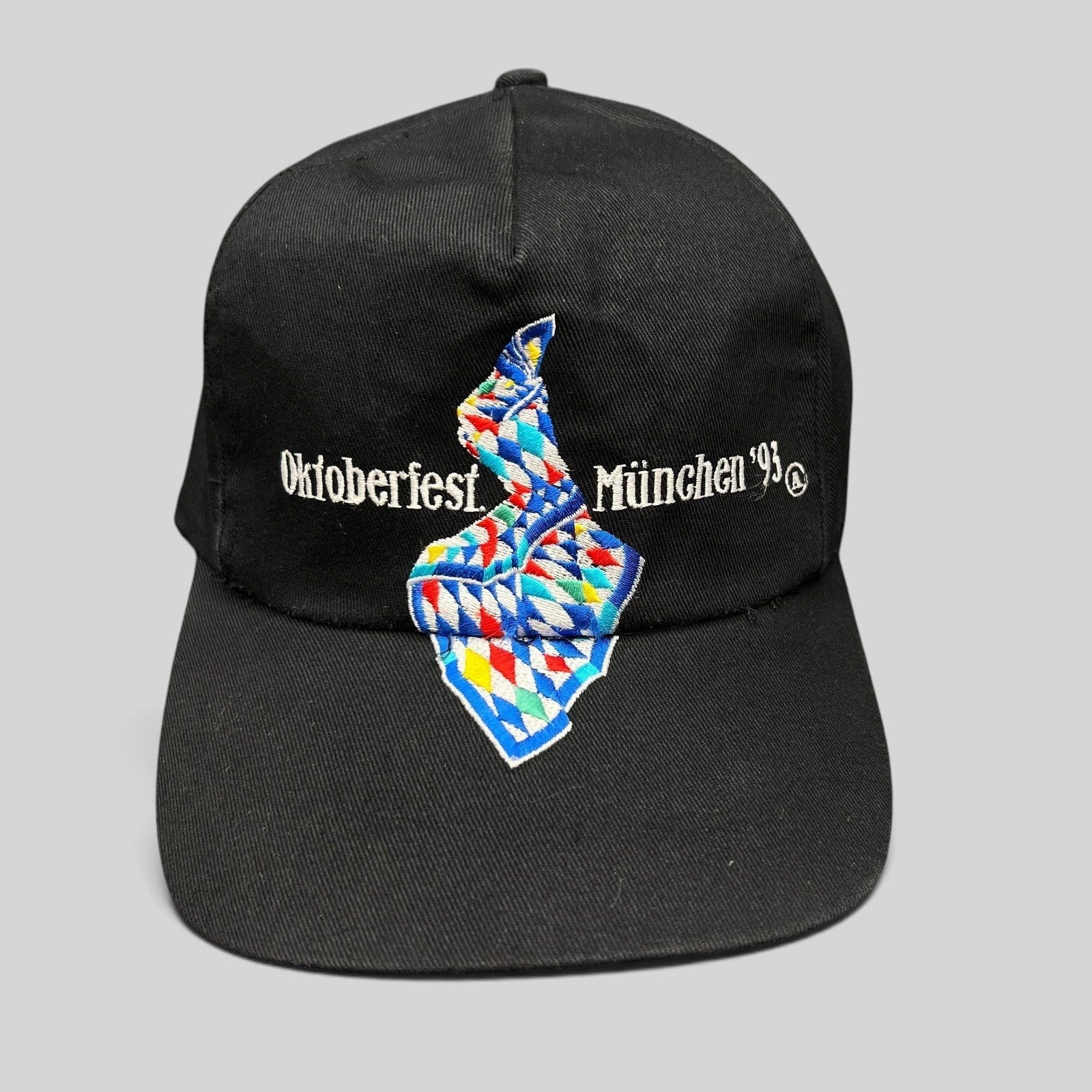 Raree Finds vintage 1993 Oktoberfest Munich black cotton strapback hat with colorful Bavarian diamond embroidery