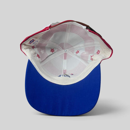 Raree Finds vintage Nissin Cap patriotic USA Olympics hat interior showing flag print lining and brass buckle strap