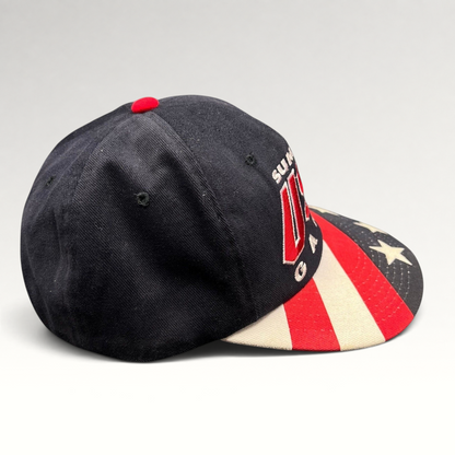 Raree Finds vintage 1996 Atlanta Olympics Starter snapback hat with black crown and American flag print brim.