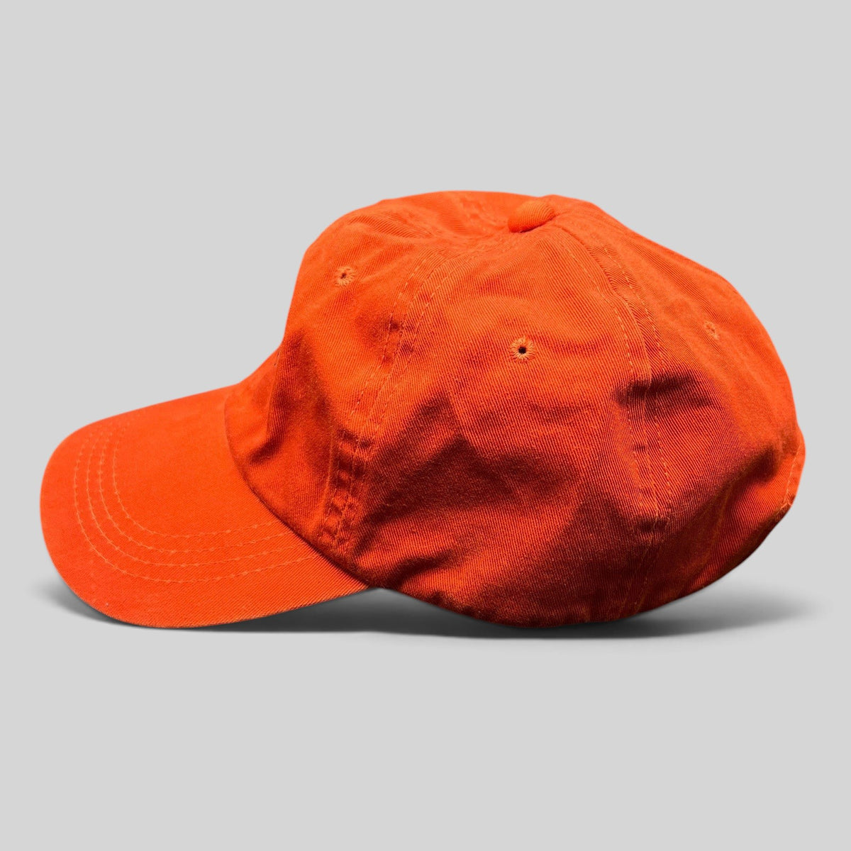 Raree Finds vintage orange cotton strapback dad cap with a curved brim and unstructured crown