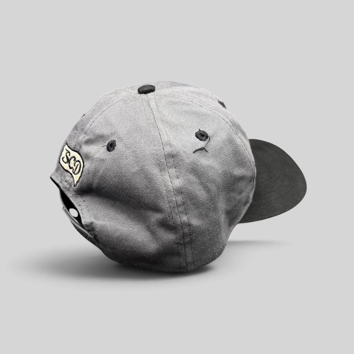 Raree Finds vintage Otto Cap snapback in gray and black cotton twill with SCD embroidery on the back