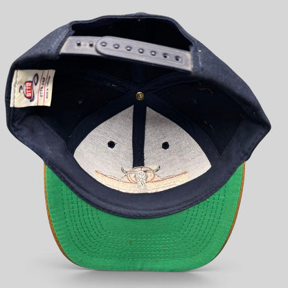 Raree Finds vintage OTTO Cap snapback showing the interior navy crown, green brim, and longhorn skull logo detail.