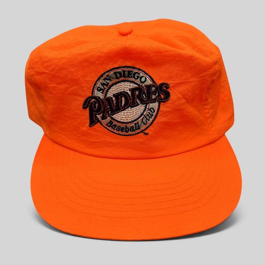 Raree Finds vintage San Diego Padres snapback hat in blaze orange nylon with an embroidered baseball club logo.