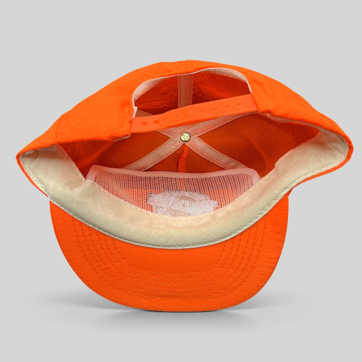 Raree Finds vintage San Diego Padres snapback hat in blaze orange nylon with adjustable plastic strap back view