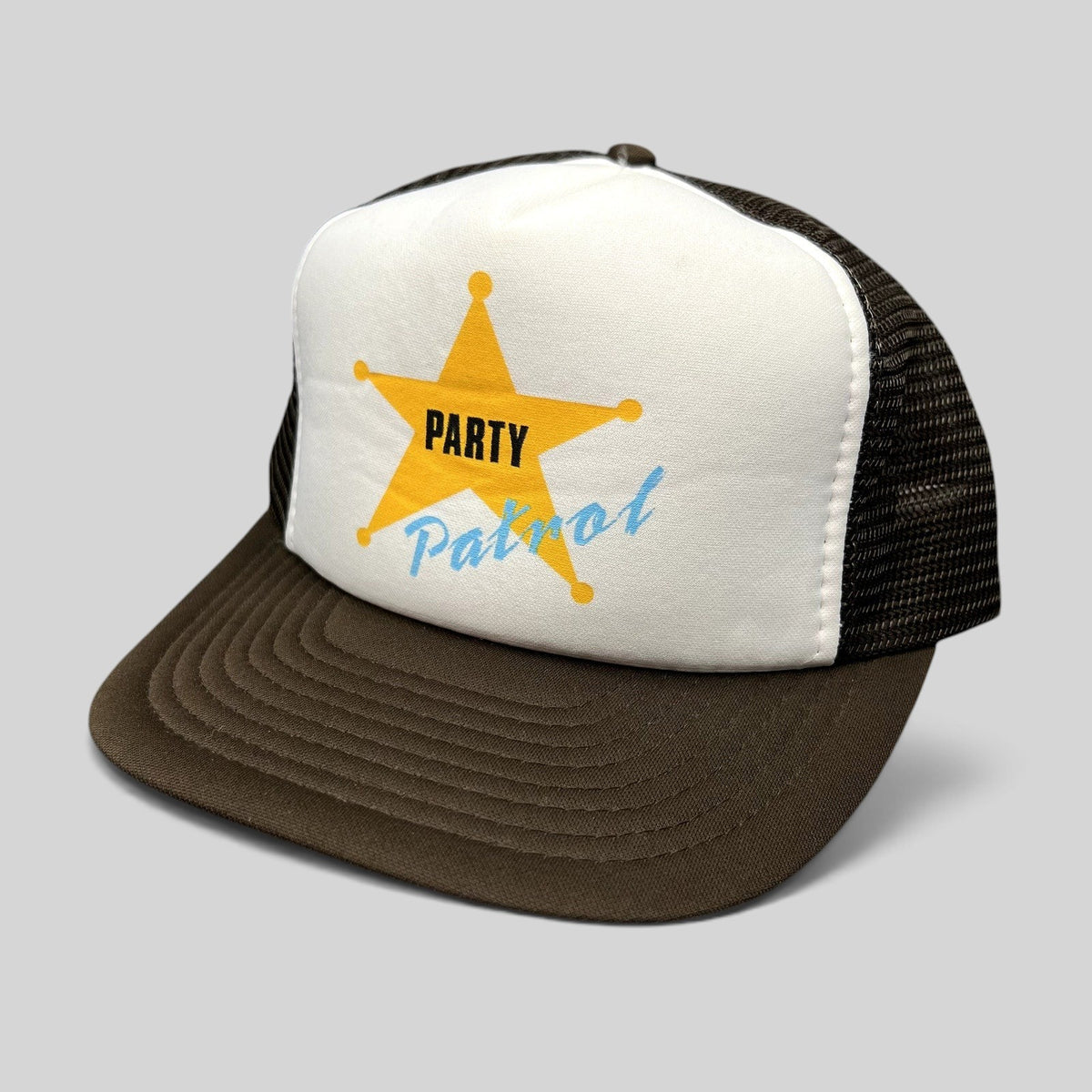 Raree Finds vintage Party Patrol trucker hat with a white foam front, brown mesh back, and yellow sheriff star graphic.