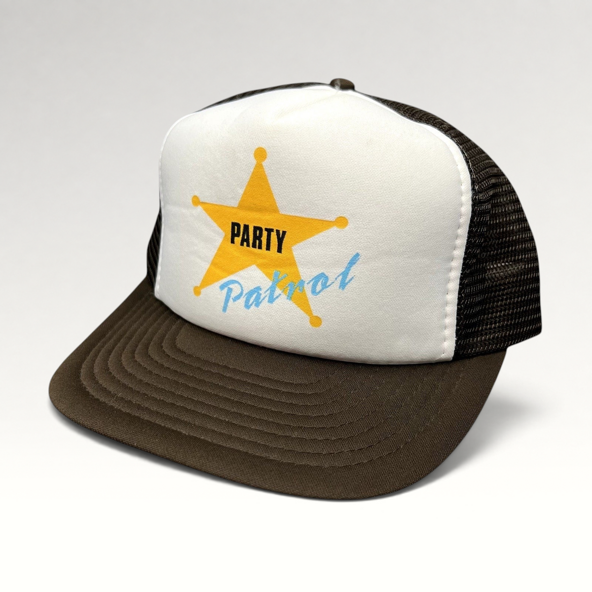 Raree Finds vintage Party Patrol trucker hat with a white foam front, brown mesh back, and yellow sheriff star graphic.