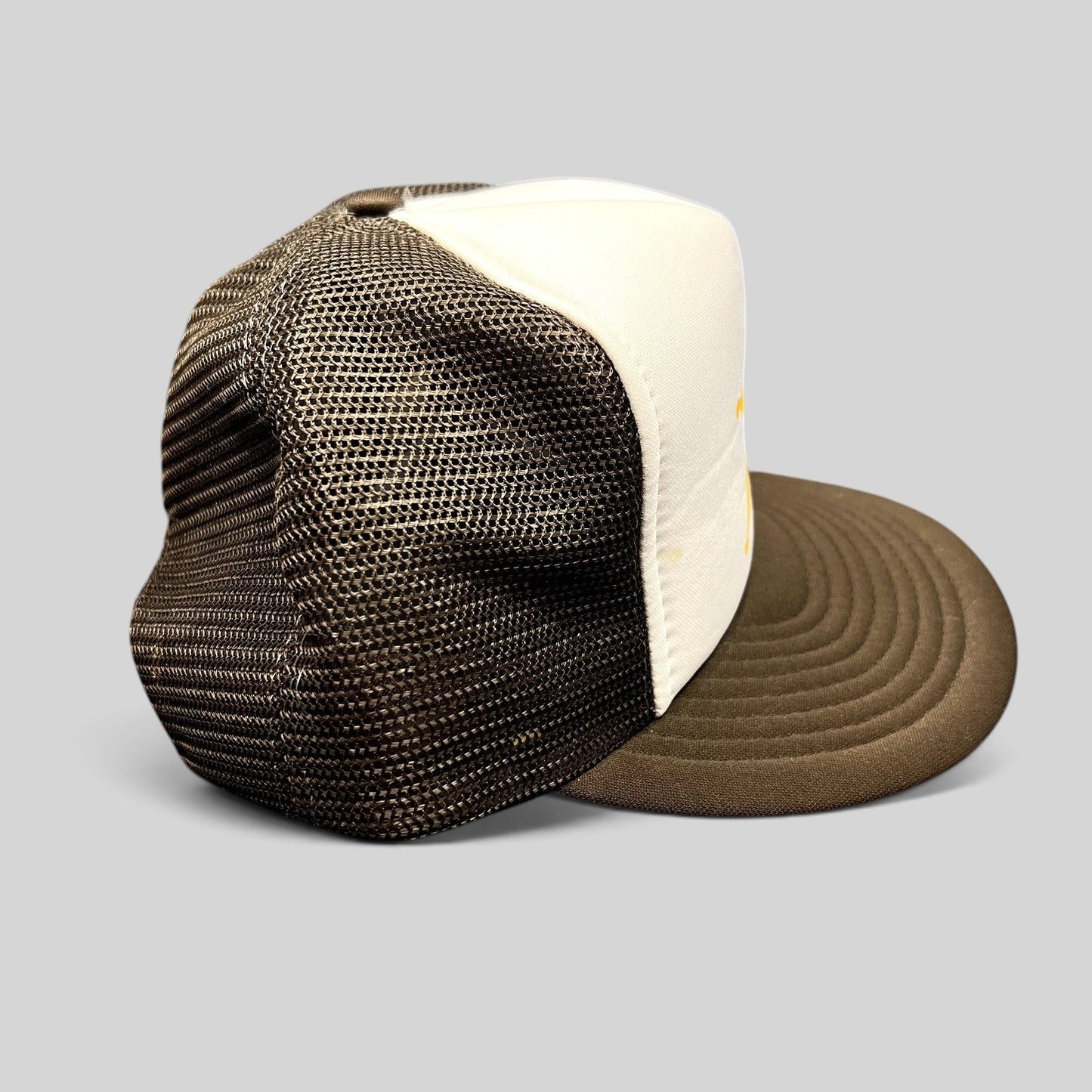 Raree Finds vintage Party Patrol trucker hat with brown mesh back, white foam front, and brown curved brim.