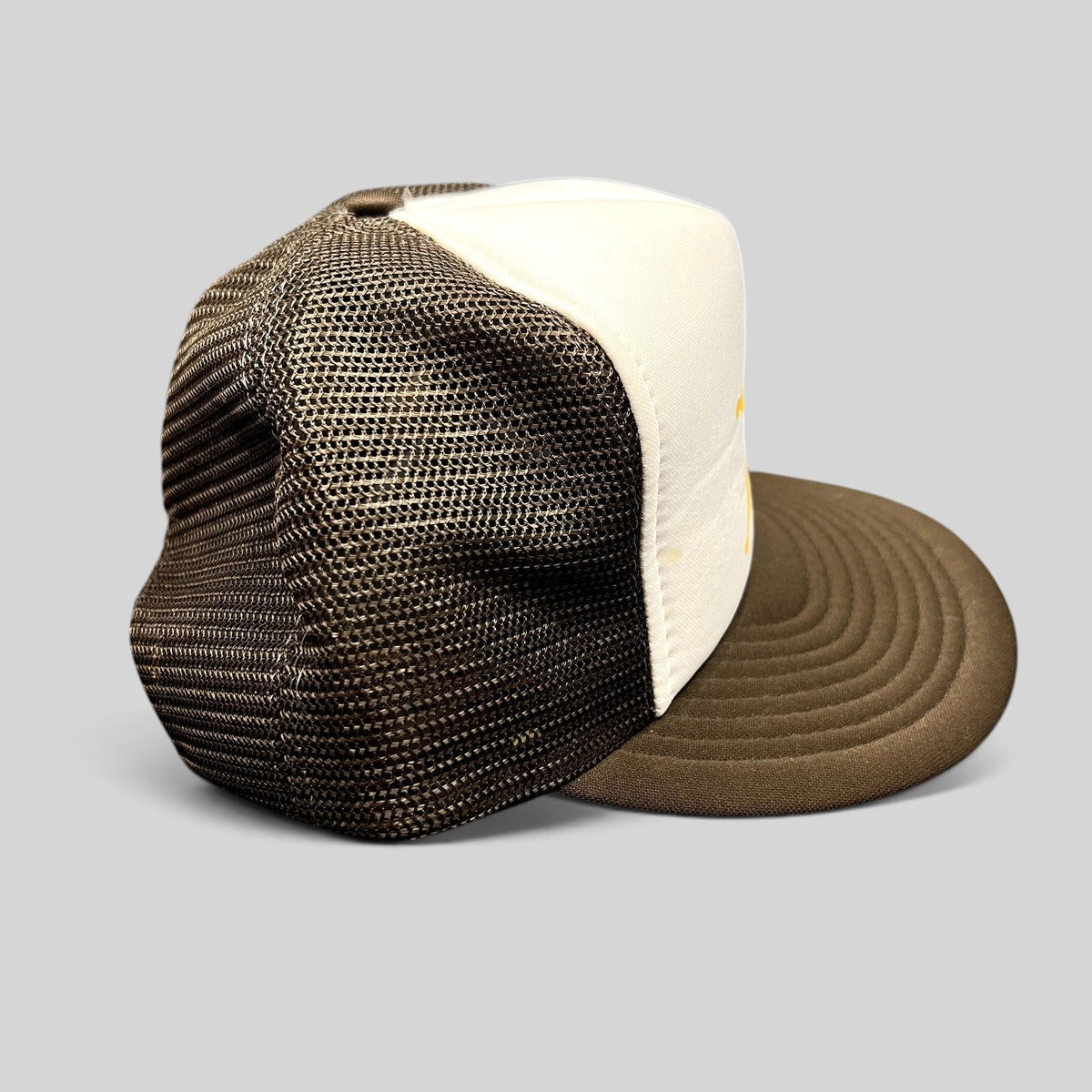 Raree Finds vintage Party Patrol trucker hat with brown mesh back, white foam front, and brown curved brim.