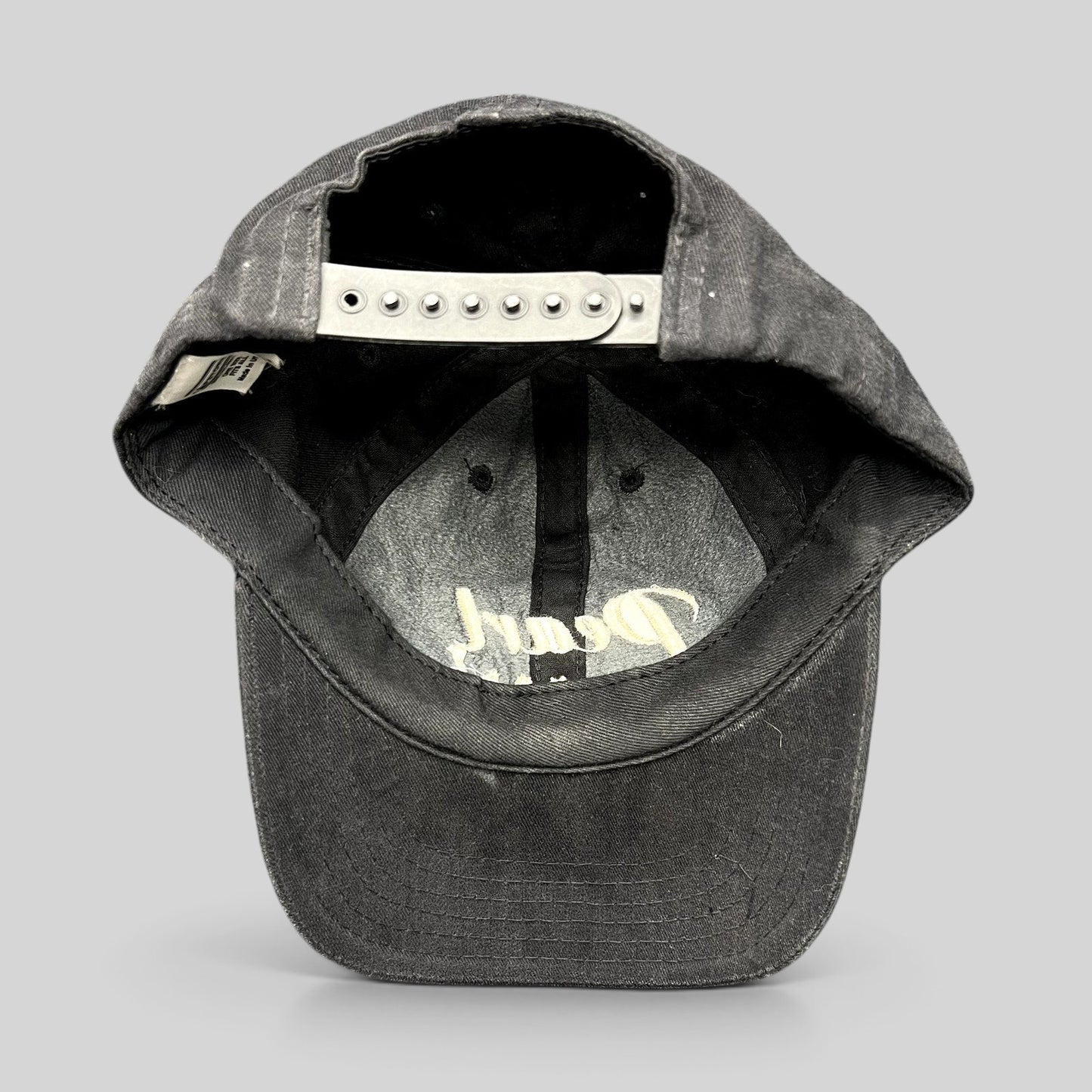 Raree Finds vintage black Pearl Vodka promotional snapback hat with adjustable plastic snap closure and curved brim