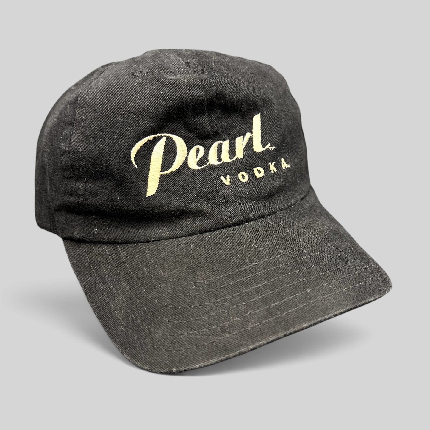 Raree Finds vintage black Pearl Vodka promotional snapback hat with cream embroidered logo and curved brim