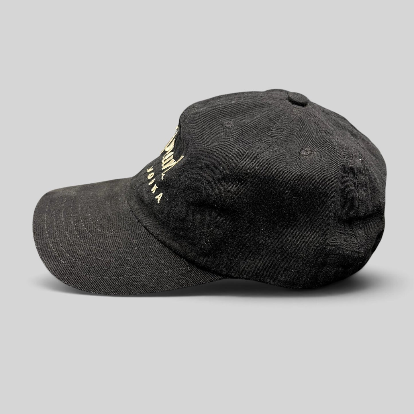 Raree Finds vintage black Pearl Vodka promotional snapback hat with cream embroidered logo and curved brim
