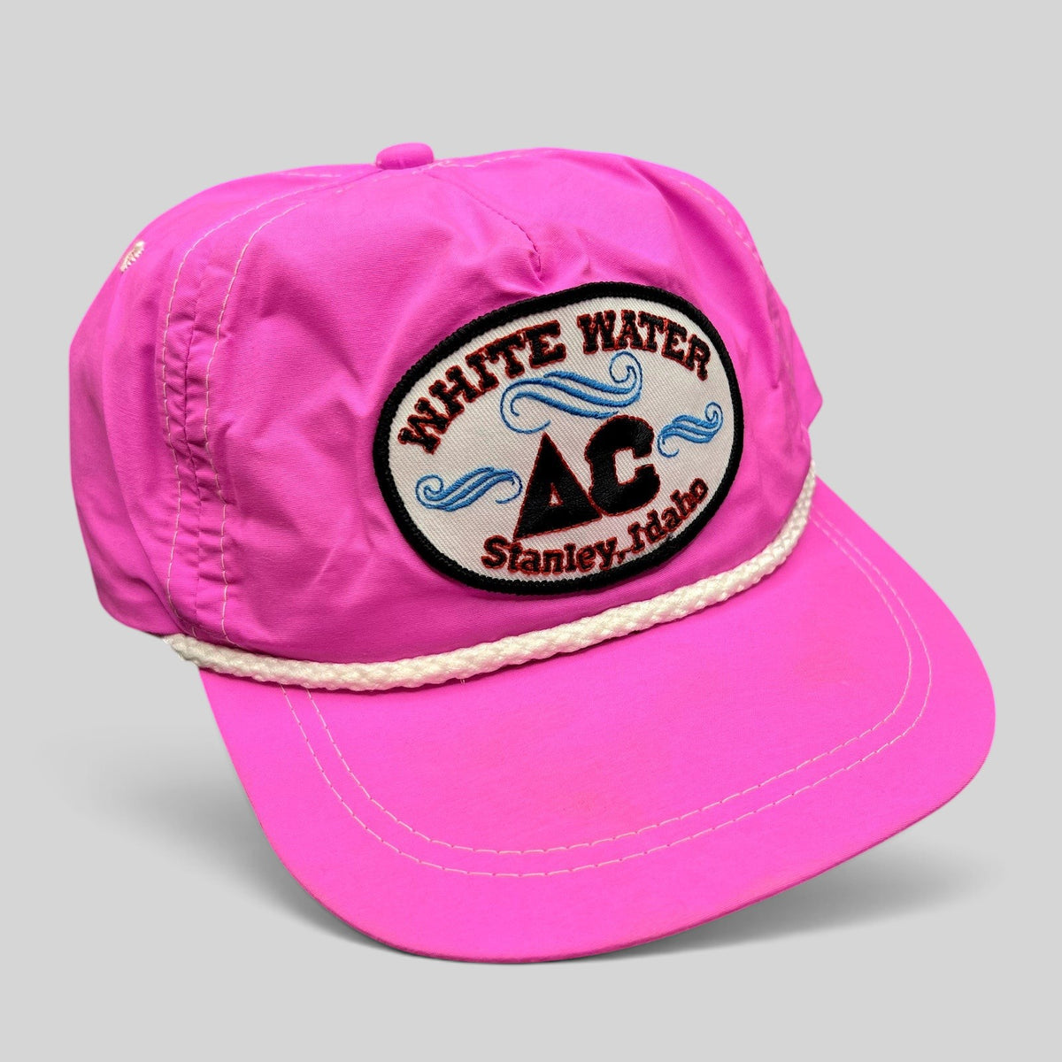 Raree Finds vintage neon pink nylon Imperial strapback hat with White Water AC Stanley Idaho patch and white rope