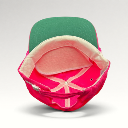Raree Finds vintage 1980s neon pink zipperback hat with a green undervisor and interior structure detail