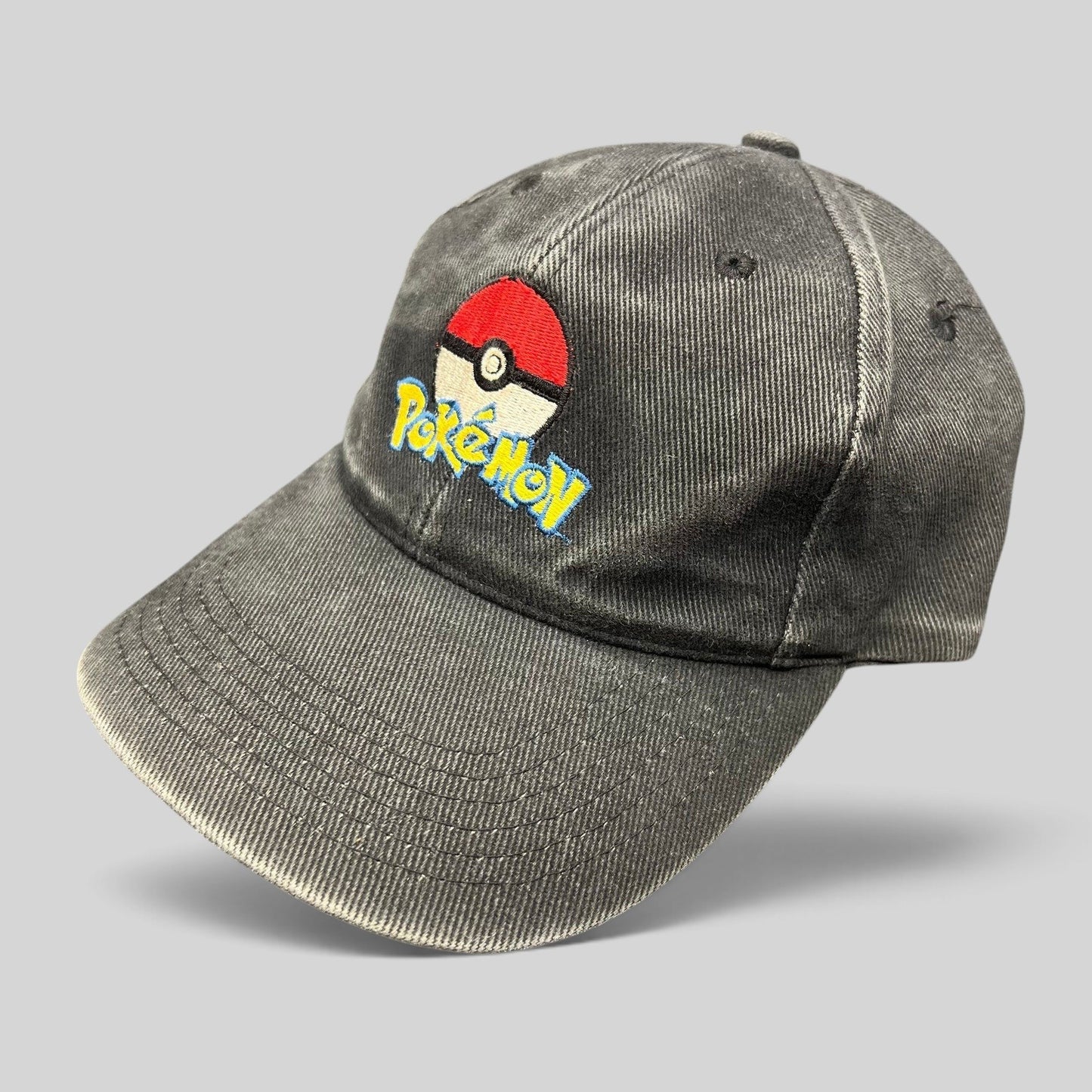 Raree Finds vintage black cotton twill strapback hat featuring an embroidered Poké Ball and Pokémon logo