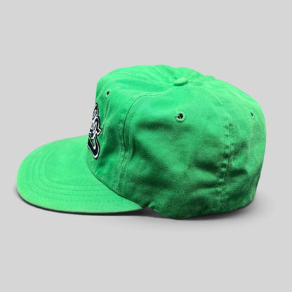 Raree Finds vintage Polo Ralph Lauren green cotton fitted hat with navy and white script logo embroidery, side view.