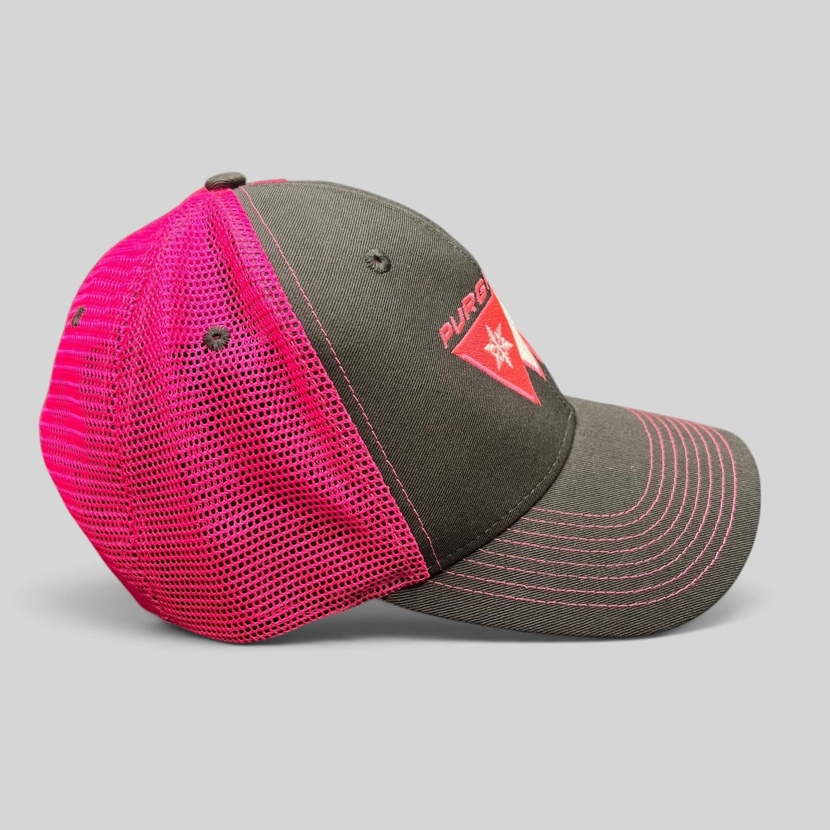 Raree Finds vintage 90s Purgatory Racing snapback hat in black cotton with neon pink mesh back and contrast stitching.