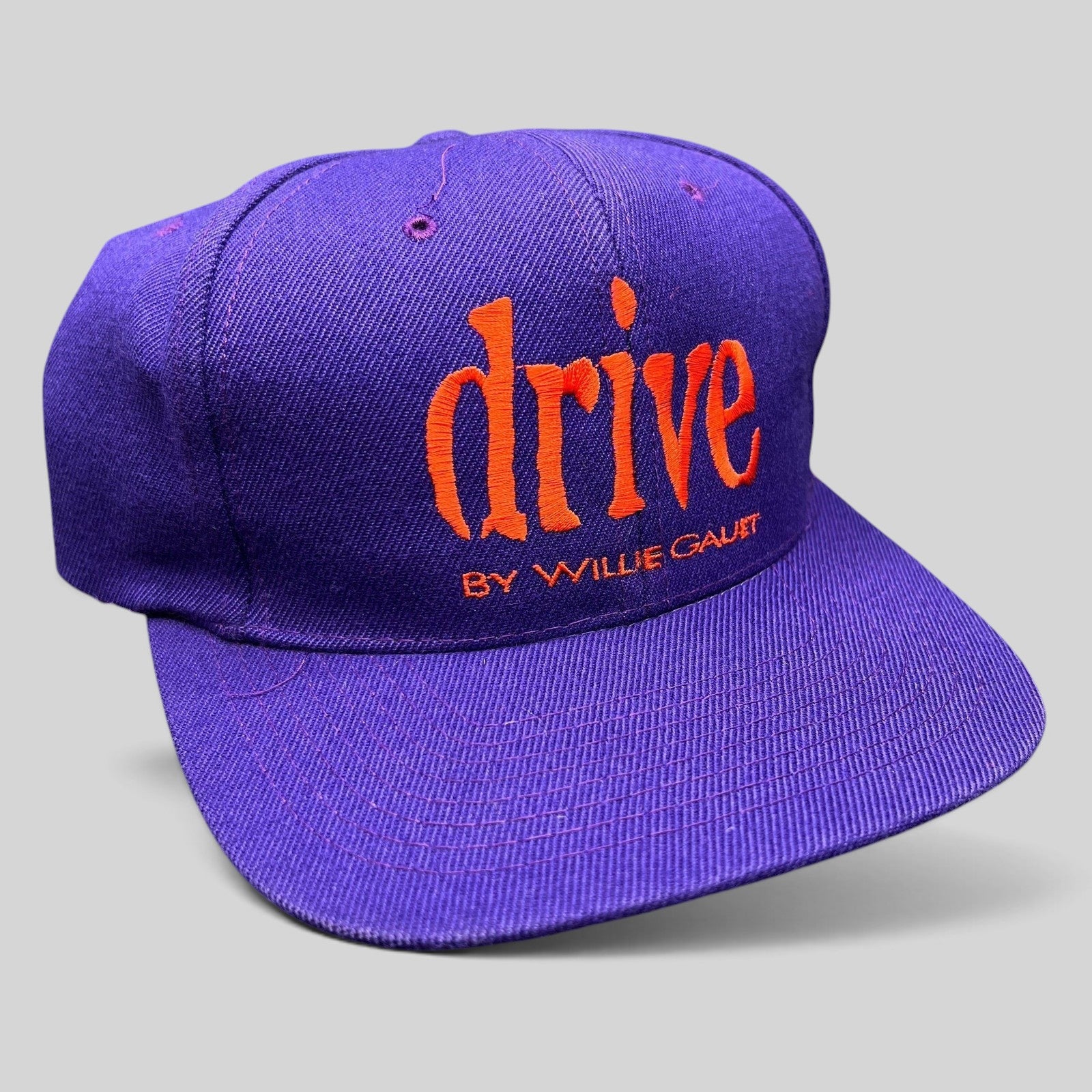 Raree Finds vintage 90s purple Nissin snapback hat with orange Drive by Willie Gault embroidery