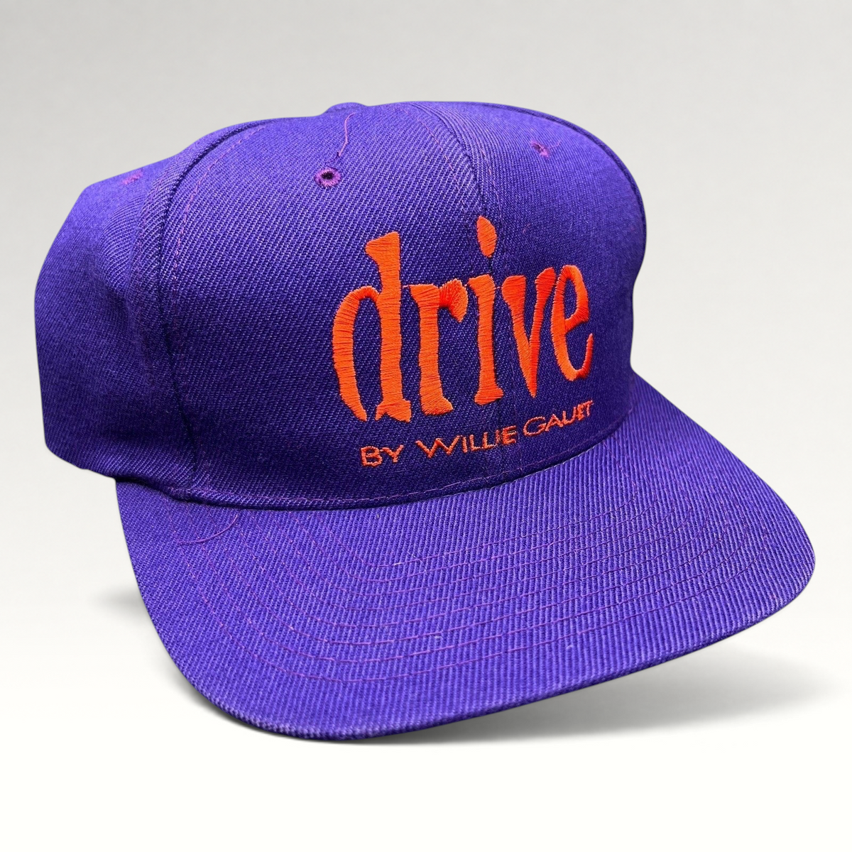 Raree Finds vintage 90s purple Nissin snapback hat with orange Drive by Willie Gault embroidery