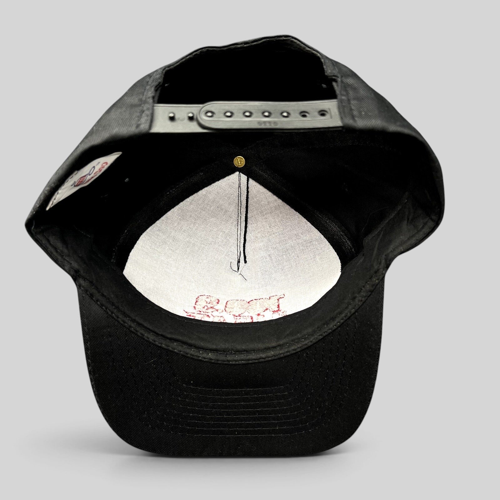 Raree Finds vintage 90s 100.9 The Heat radio station snapback cap showing the interior black crown and adjustable strap