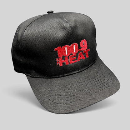 Raree Finds vintage 90s 100.9 The Heat radio station snapback hat with red embroidery on a black structured crown.