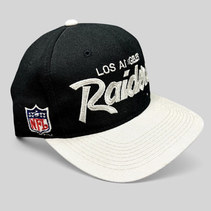 Raree Finds vintage Sports Specialties Los Angeles Raiders snapback hat with white script embroidery and NFL side logo