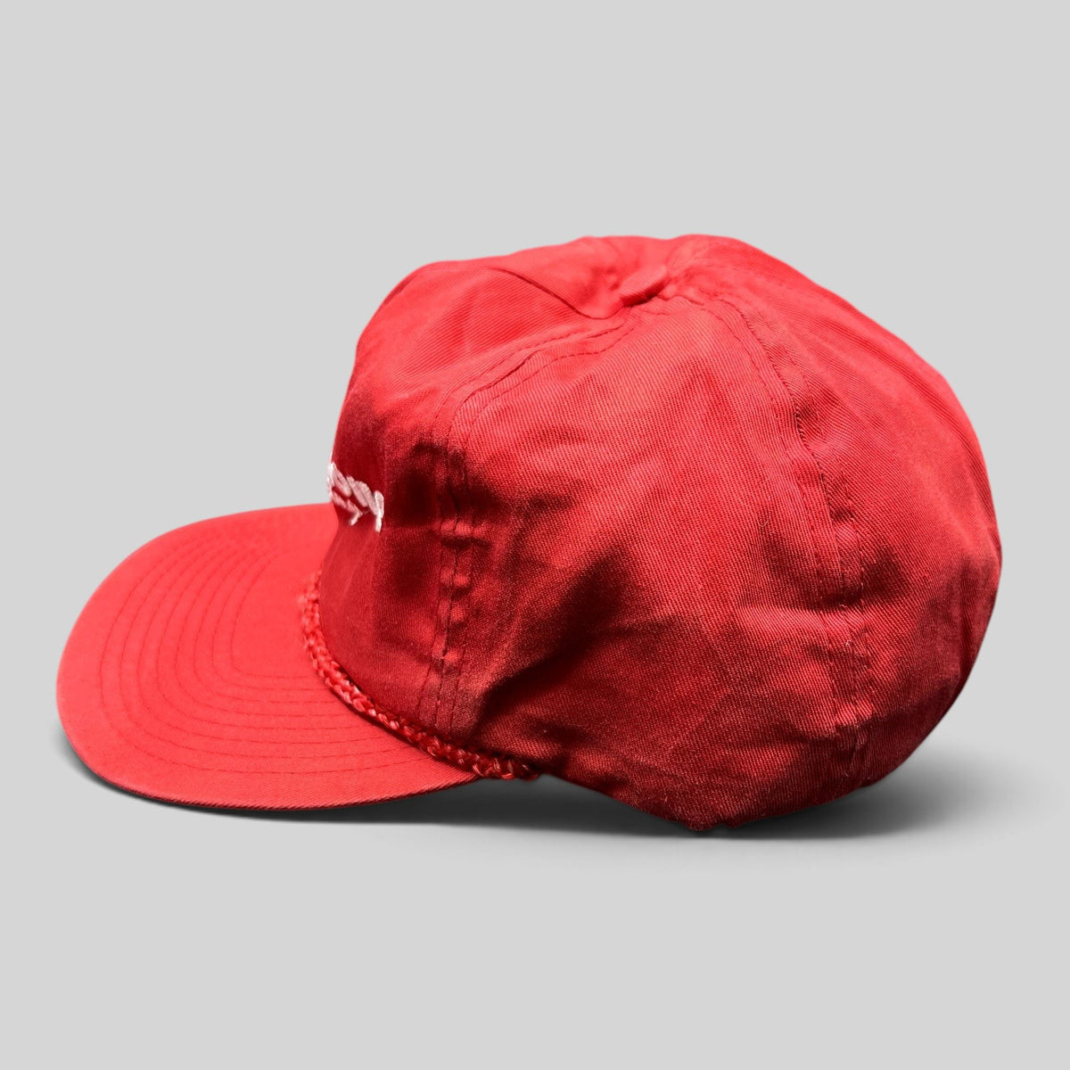 Raree Finds vintage red Firestone Racing snapback hat with white embroidered logo and braided rope brim detail