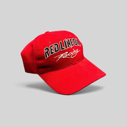 Raree Finds vintage red Red Line Oil Racing snapback hat with black and white embroidery on a structured crown