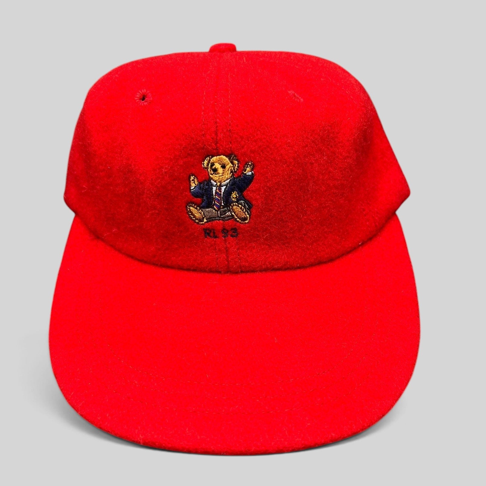 Raree Finds vintage red wool Polo Ralph Lauren cap featuring an embroidered suited Polo Bear and RL 93 logo