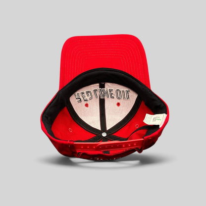 Raree Finds vintage red Kudzu snapback hat interior showing structured crown, stitched eyelets, and brand label.