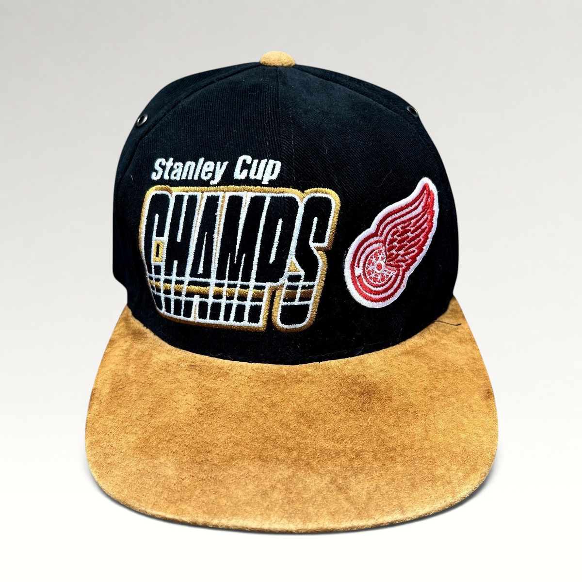 Raree Finds vintage 1997 Detroit Red Wings Stanley Cup Champs Starter strapback hat with black crown and tan brim