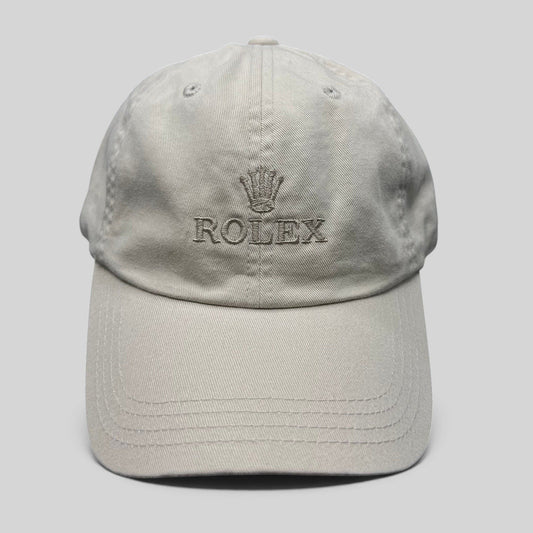 Raree Finds vintage khaki cotton Rolex strapback golf hat with tonal crown logo embroidery and metal buckle closure.