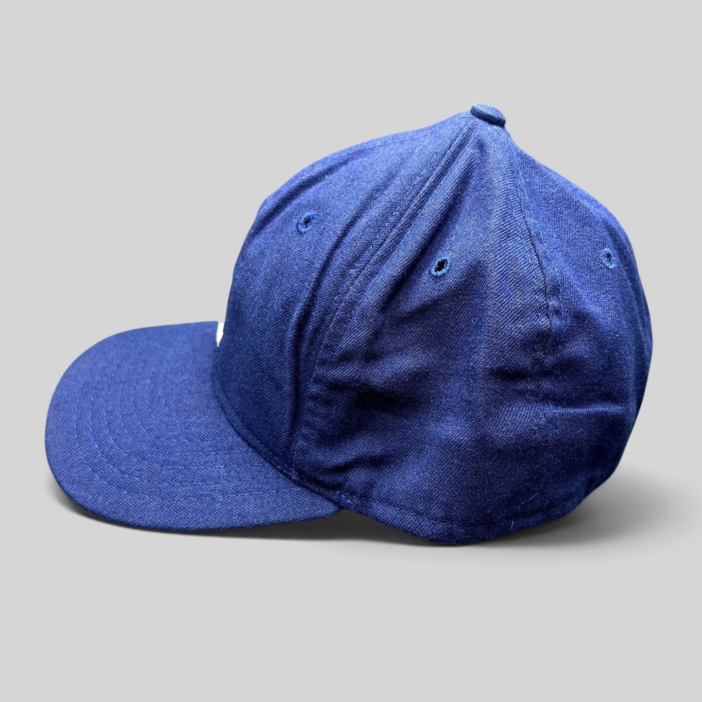 Raree Finds vintage Roman Pro Cooperstown Collection royal blue wool baseball cap with side profile view