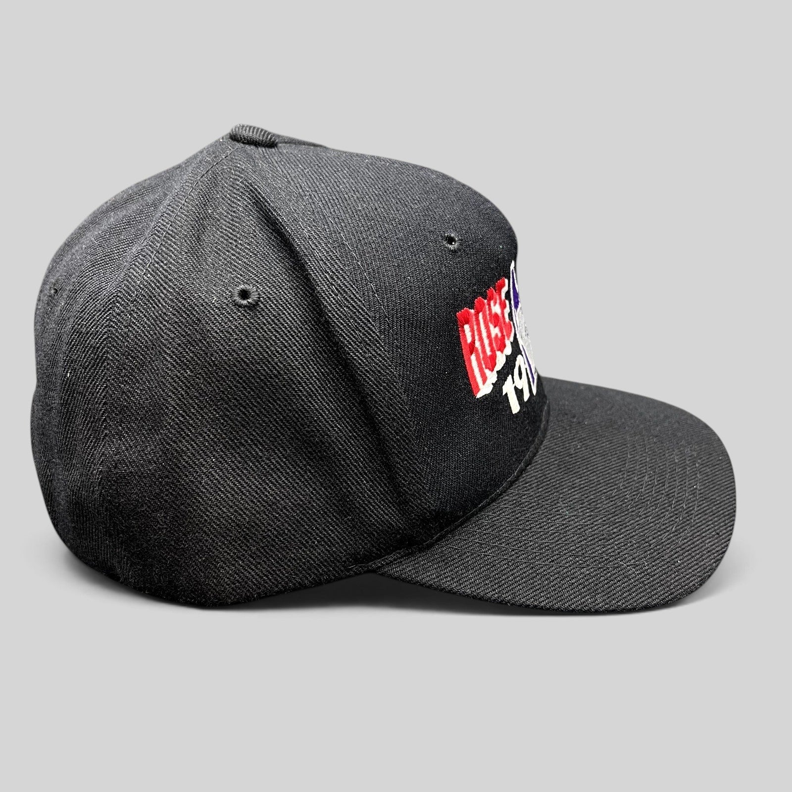 Raree Finds vintage 1996 Rose Bowl Northwestern Wildcats black wool blend snapback hat with embroidered graphics