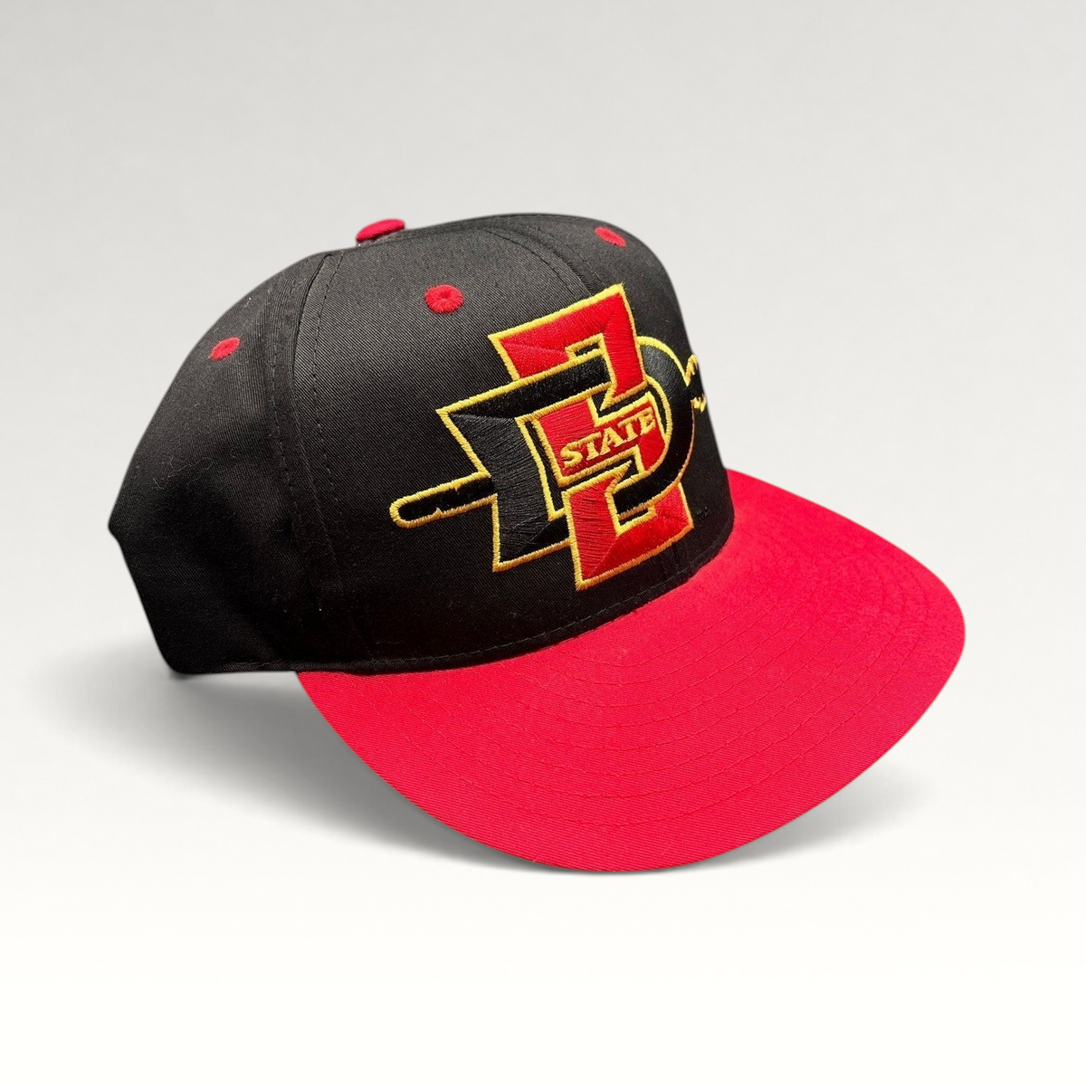 Raree Finds vintage Eclipse San Diego State Aztecs snapback hat in black and red cotton with gold embroidered logo.