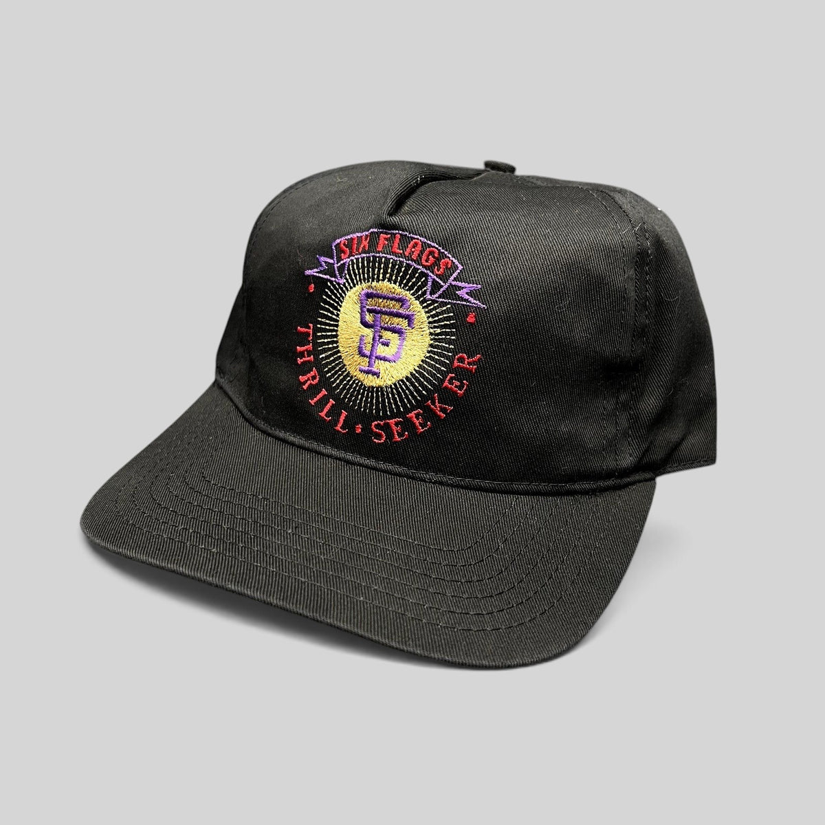 Raree Finds vintage 90s Six Flags Thrill Seeker black snapback hat with colorful embroidered amusement park logo