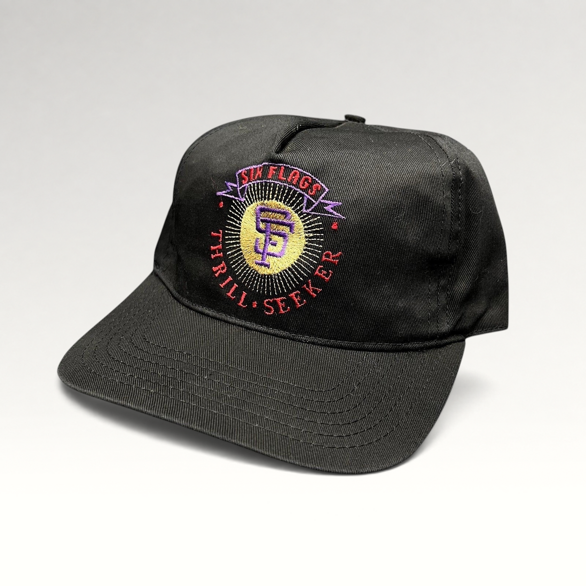 Raree Finds vintage 90s Six Flags Thrill Seeker black snapback hat with colorful embroidered amusement park logo