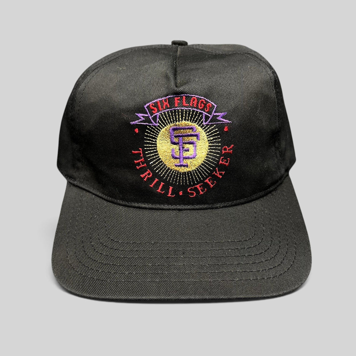 Raree Finds vintage 90s Six Flags Thrill Seeker black snapback hat with colorful embroidered amusement park logo