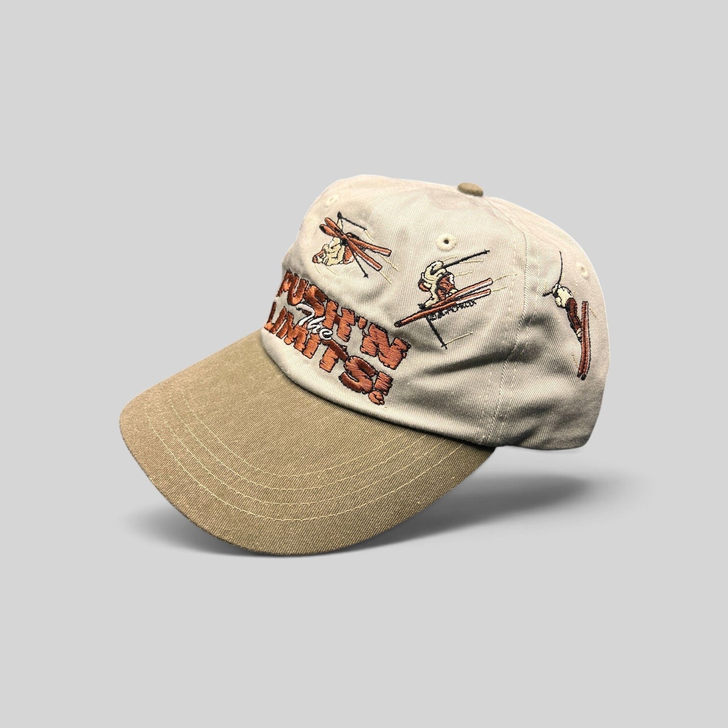 Raree Finds vintage 90s Attitude strapback hat in stone and olive with embroidered skiers and Pushin the Limits text