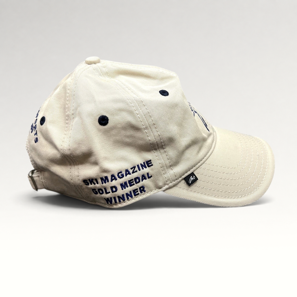 Raree Finds vintage cotton strapback hat in beige with Ski Magazine Gold Medal Winner embroidery and metal buckle