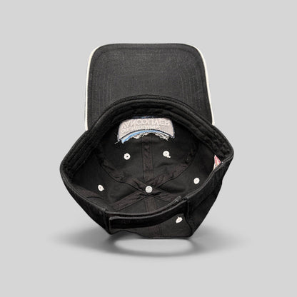 Raree Finds vintage black US Ski Team Vancouver countdown cotton strapback hat, interior view showing construction.