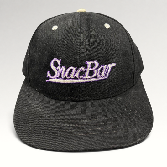 Raree Finds vintage 90s black snapback hat with purple SnacBar script embroidery and a structured front panel