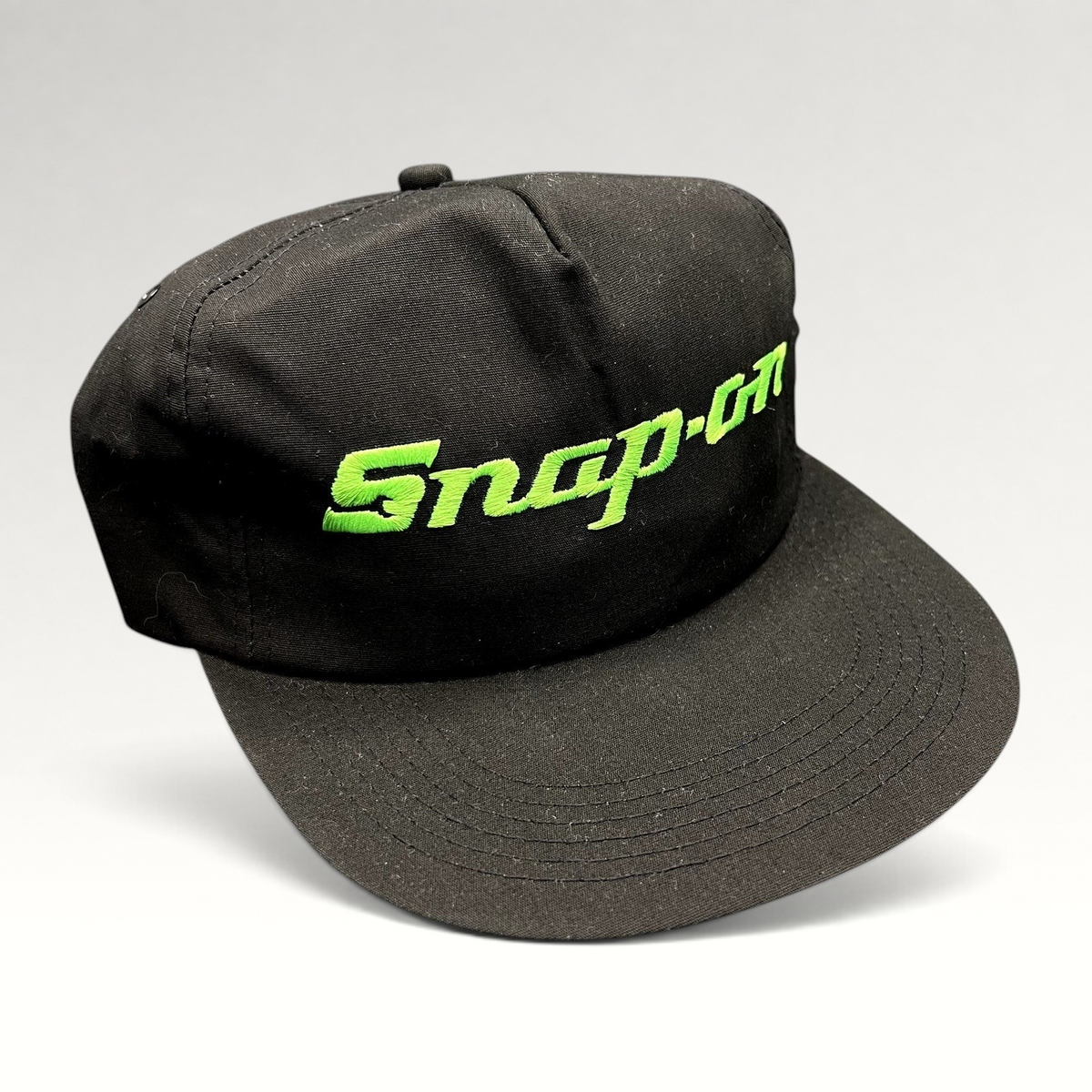 Raree Finds vintage 90s black snapback hat with neon green embroidered Snap-on Tools logo on the front