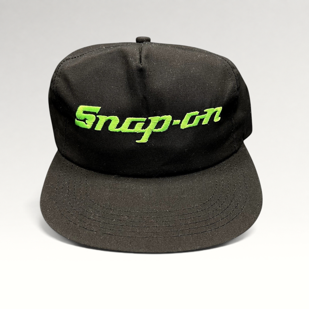Raree Finds vintage 90s black snapback hat with neon green embroidered Snap-on Tools logo on the front