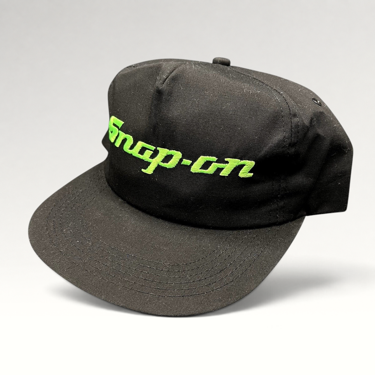 Raree Finds vintage 90s black snapback hat with neon green embroidered Snap-on Tools logo on the front